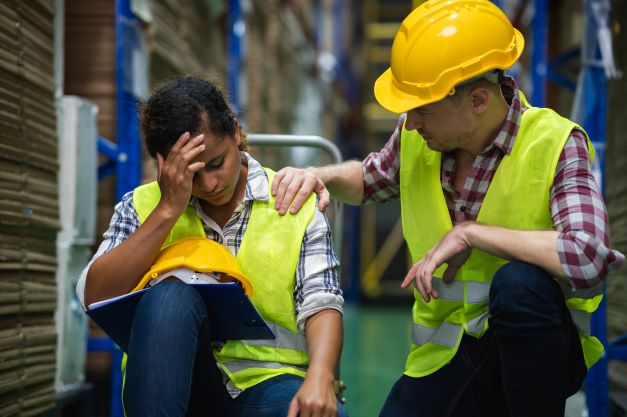 Here, one employee comforts another during a stressful time. Fatigue, stress and mental health conditions can contribute to impairment on the job or behind the wheel.