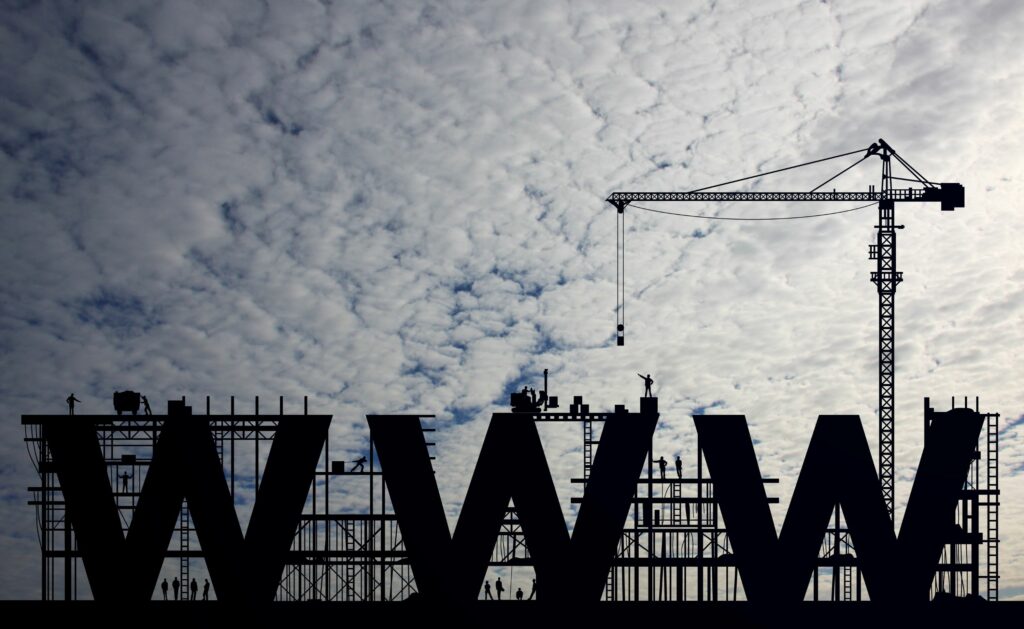 This is an illustration of a crane lifting the "WWW" as part of a website construction project.