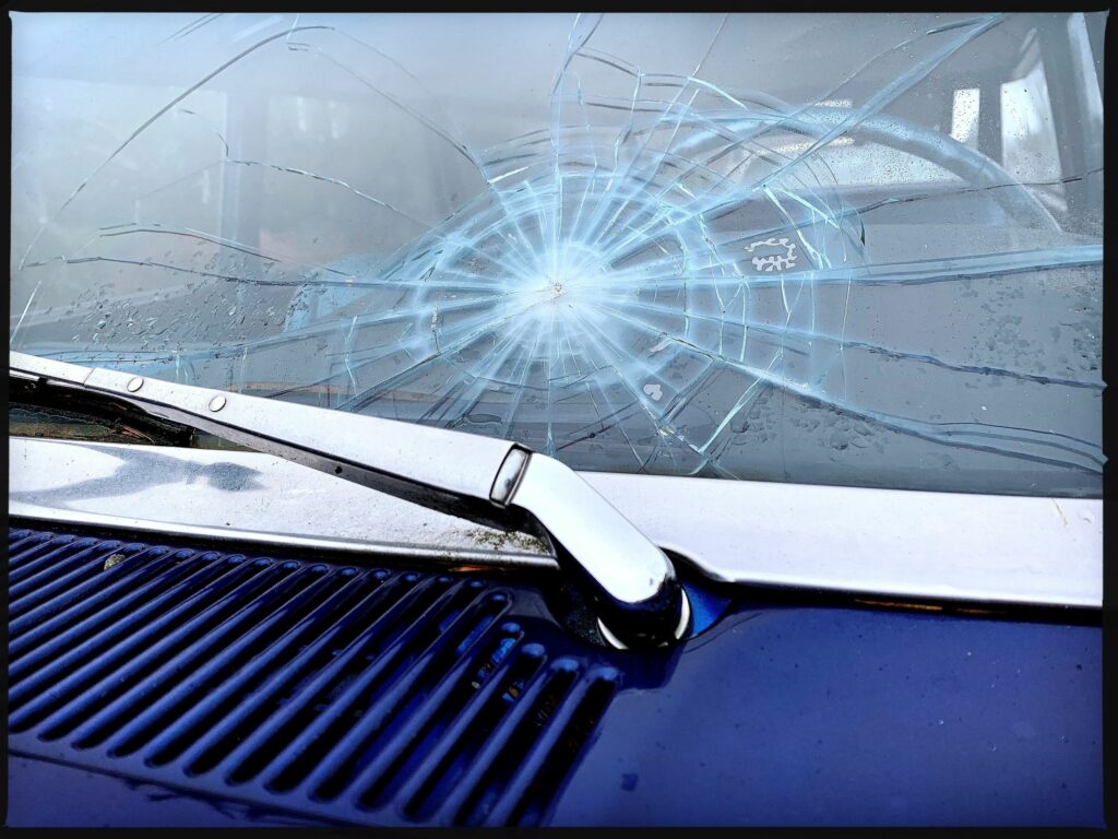 This is an image of a cracked windshield on a vehicle.