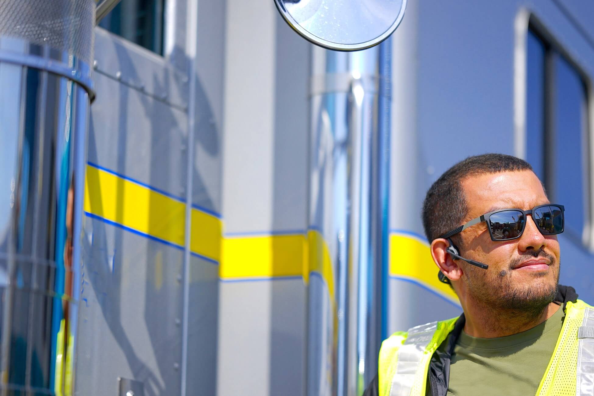 A truck diver is pictured here finishing up a safety check.
